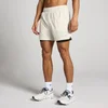 Vyrų 5" 2-in-1 treniruočių šortai - Kreminė
